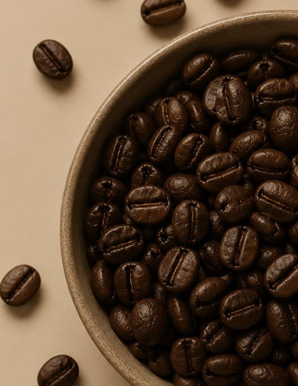 Roasted Arabica beans in a stoneware bowl